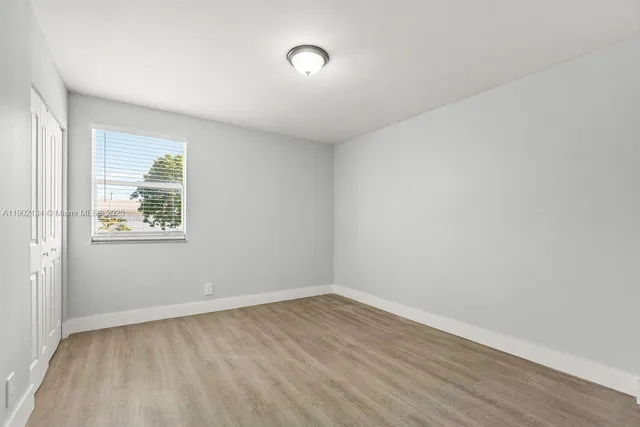 an empty room with a window