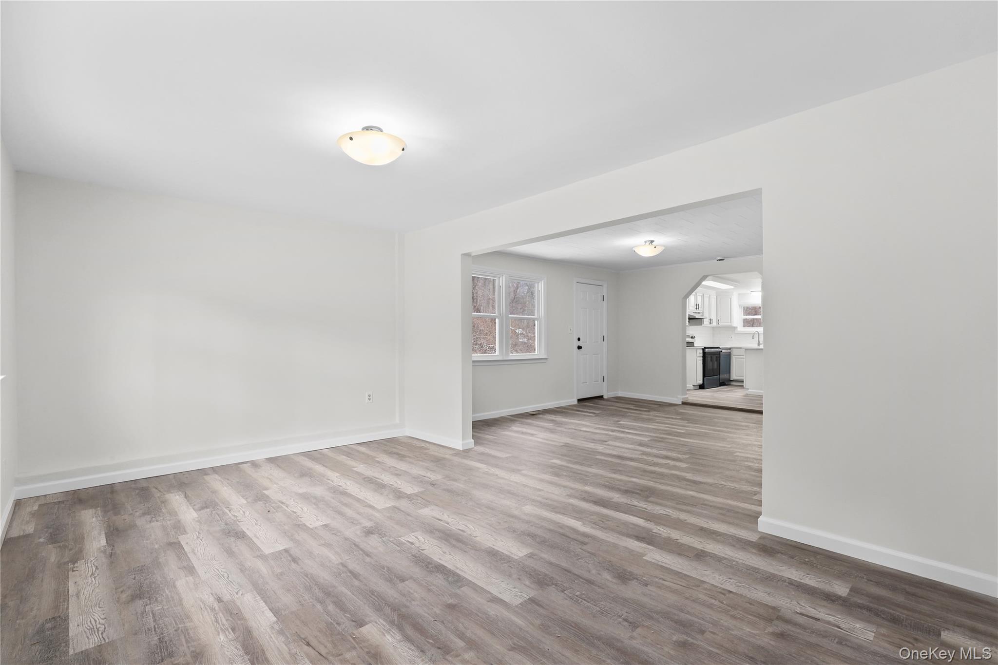 28 Quaker Road Carmel, NY 10512 - Photo 6 of 16 a view of empty room with wooden floor
