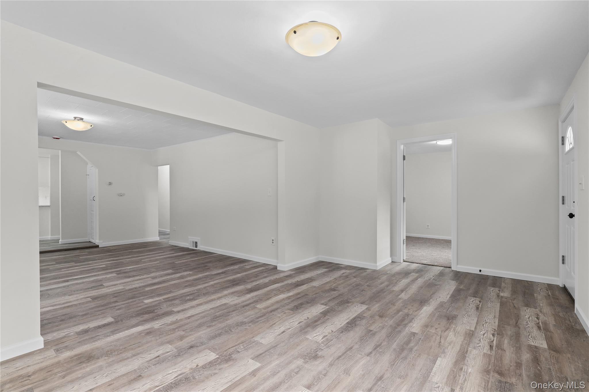 28 Quaker Road Carmel, NY 10512 - Photo 7 of 16 a view of an empty room and wooden floor