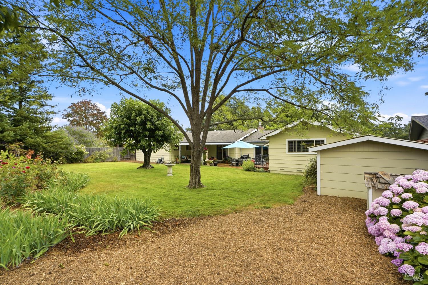 373 Piezzi Road Santa Rosa, CA 95401 - Photo 41 of 55 a front view of a house with garden