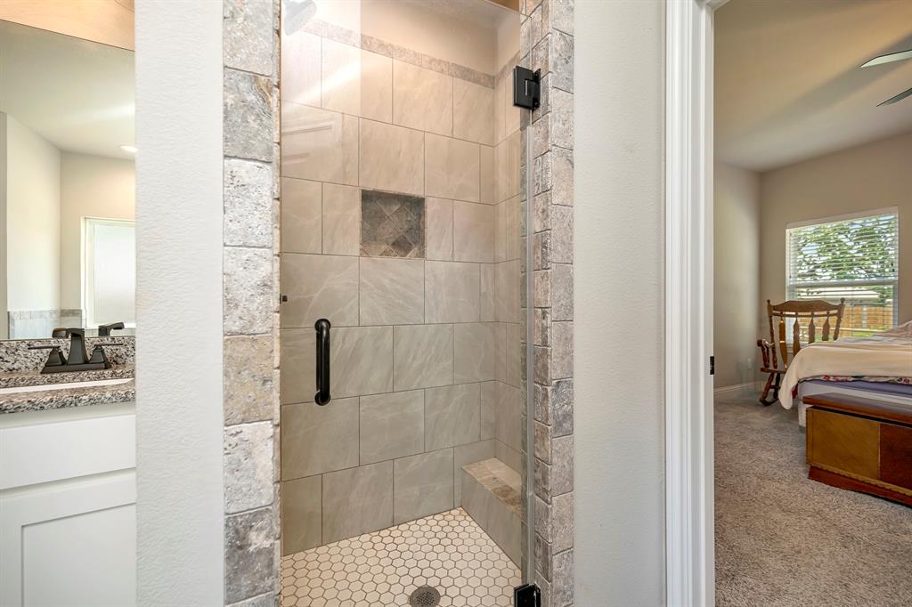 917 East 3rd Street Springtown, TX 76082 - Photo 22 of 32 Oversized and tiled shower!