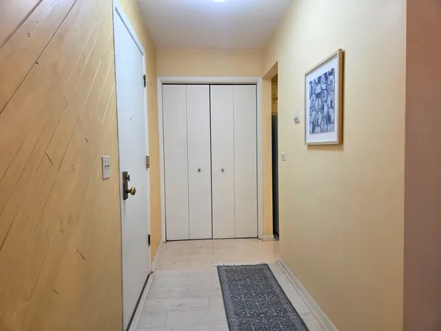 a view of room with window and hardwood