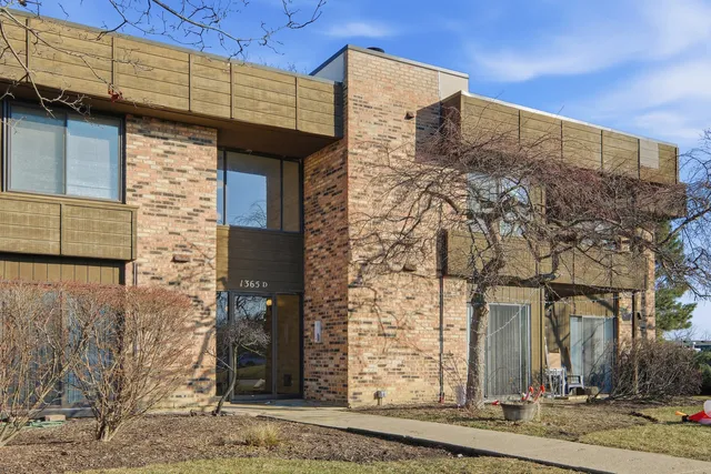 a front view of a building with pathway