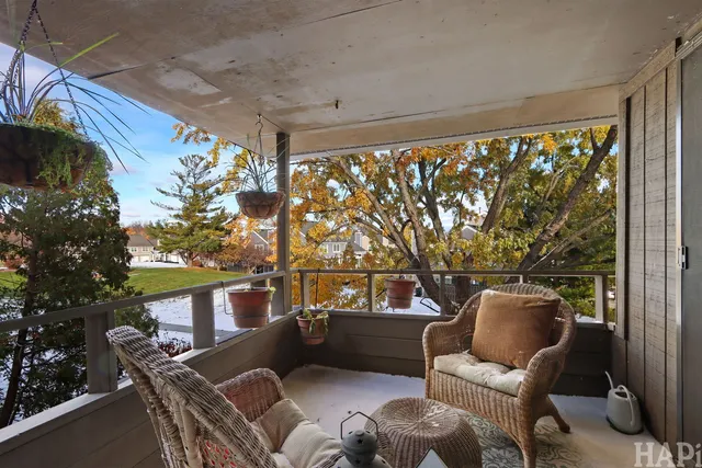 a outdoor living space with furniture and garden view