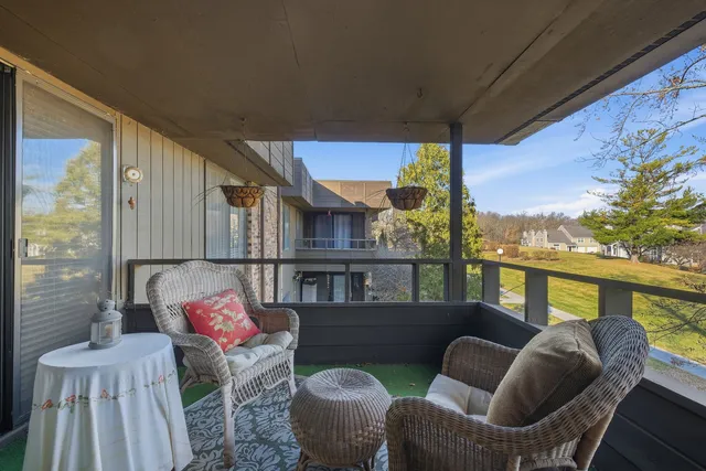 a balcony with furniture