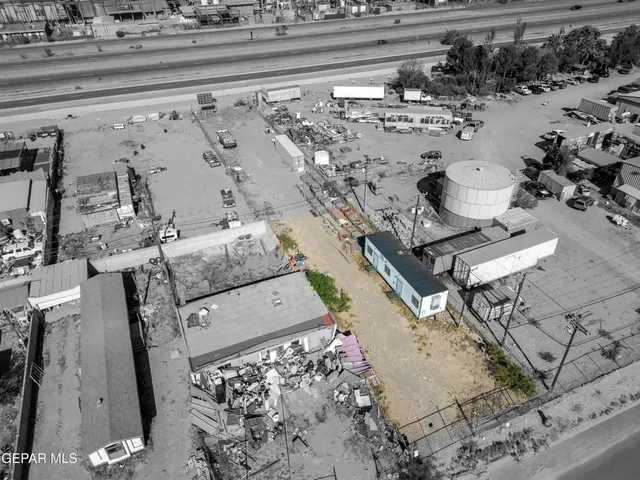 a view of a terrace with wooden benches