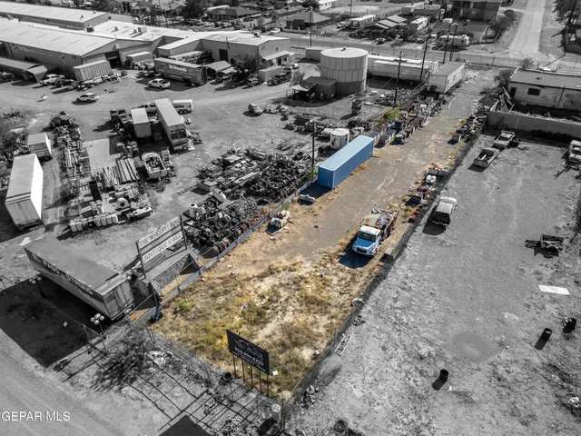 an aerial view of residential house with yard