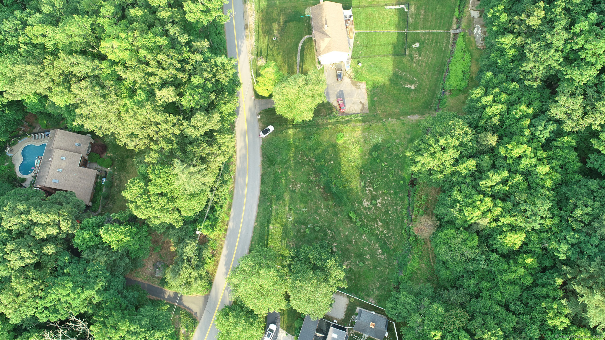 390 Ash Swamp Road Glastonbury, CT 06033 - Photo 5 of 10 a view of a garden