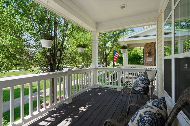 a view of balcony with furniture