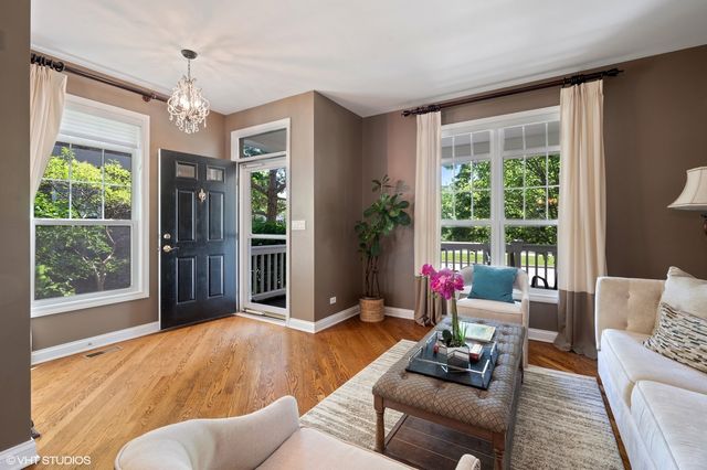 a living room with furniture and window