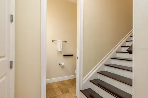 a bathroom with a sink a mirror and shower