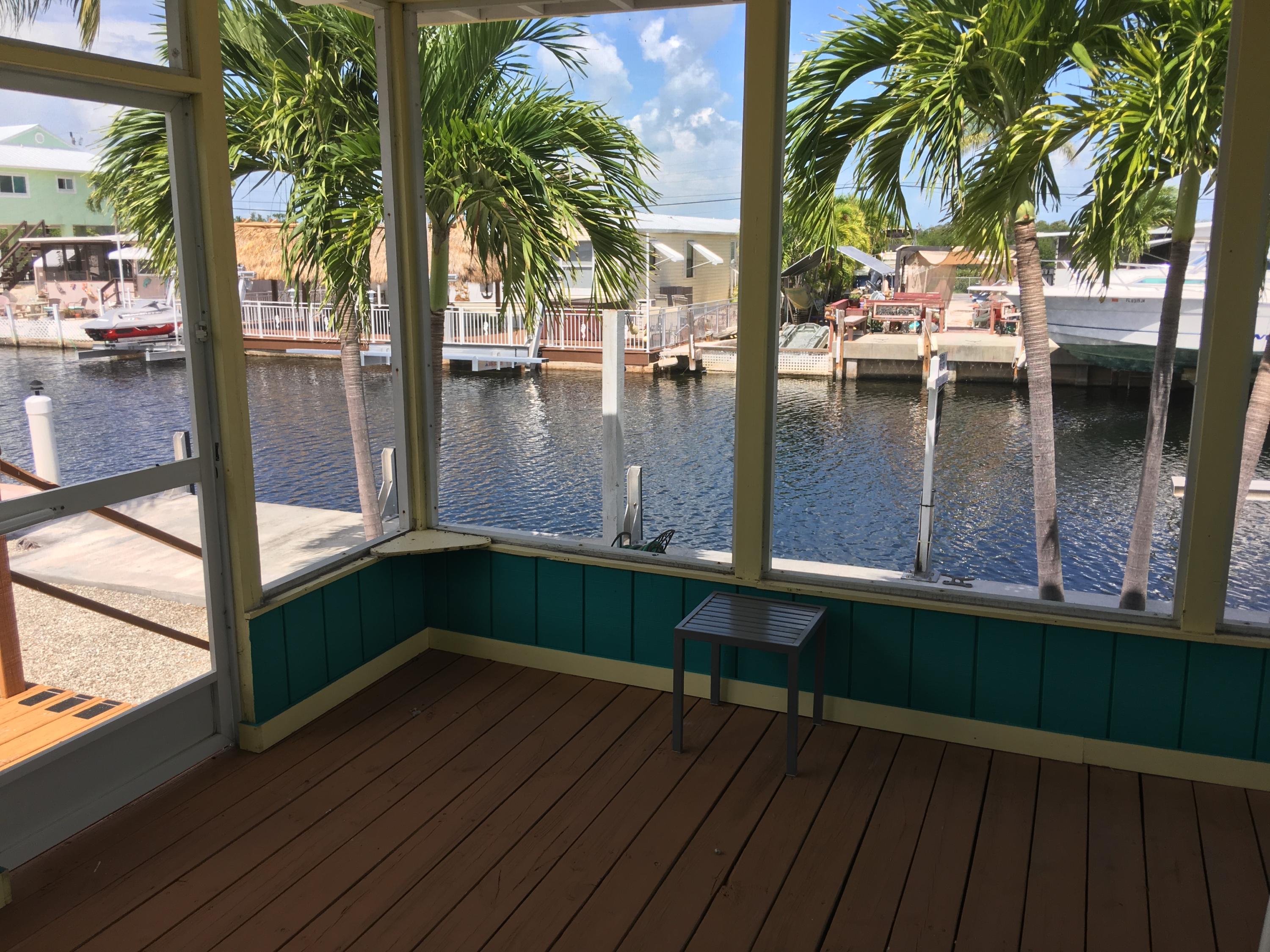 146 Long Key Road Key Largo, FL 33037 - Photo 15 of 18 Screened porch
