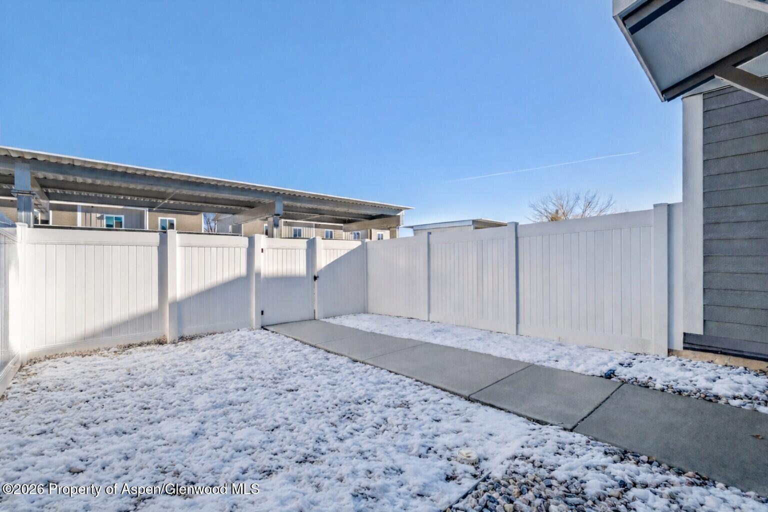 763 Russell Street Craig, CO 81625 - Photo 21 of 25 a view of a backyard of the house