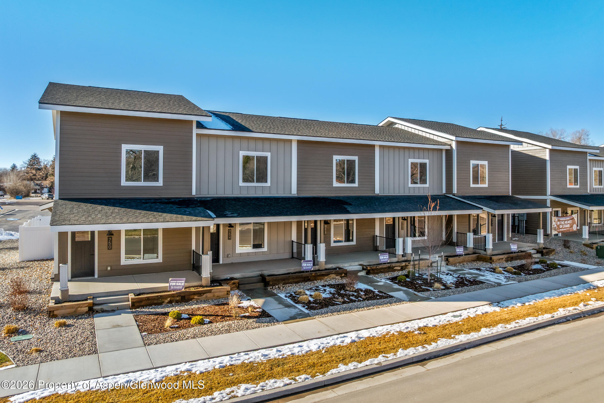 763 Russell Street Craig, CO 81625 - Photo 24 of 25 a front view of a house with yard