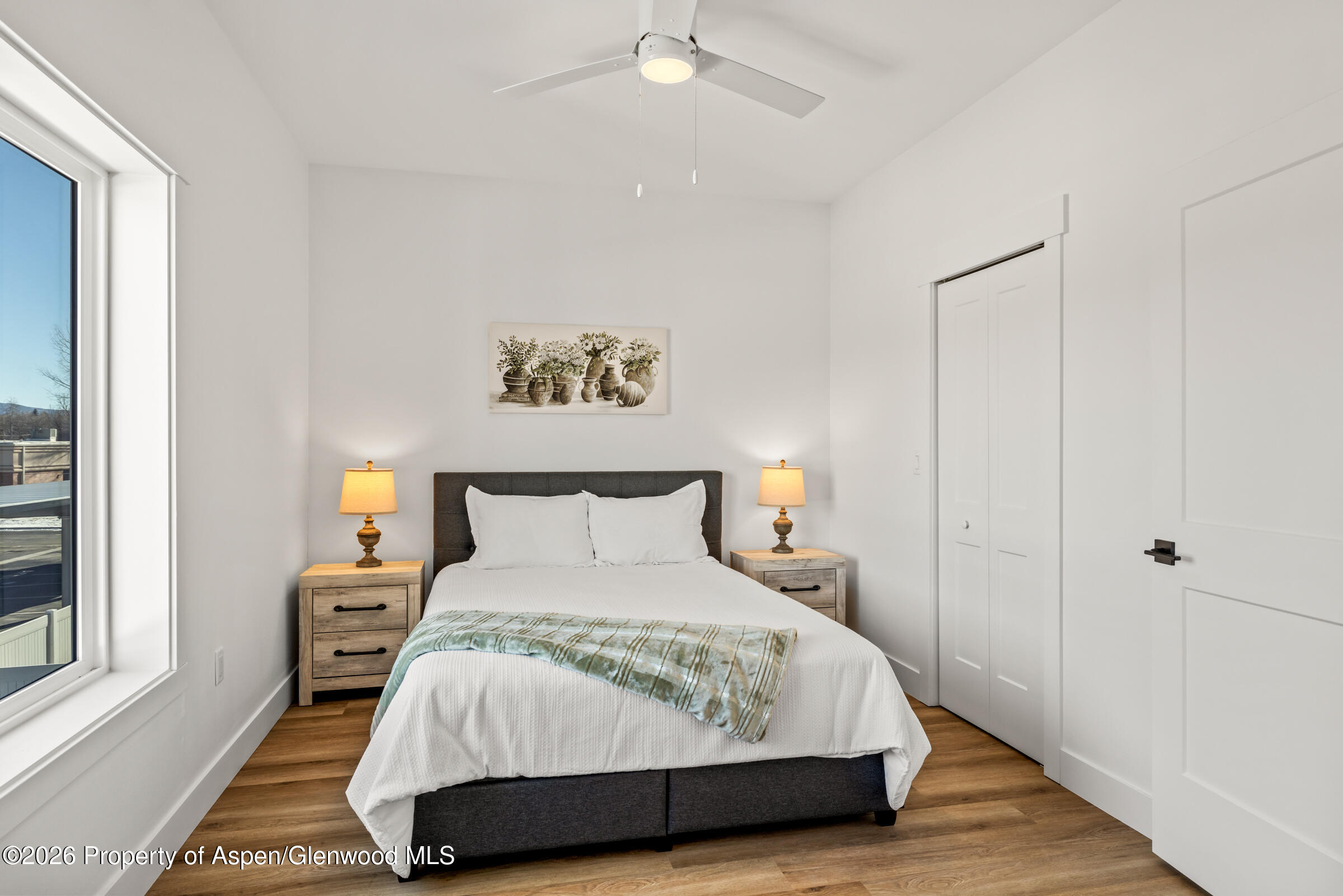 763 Russell Street Craig, CO 81625 - Photo 10 of 25 a bedroom with a bed and a window