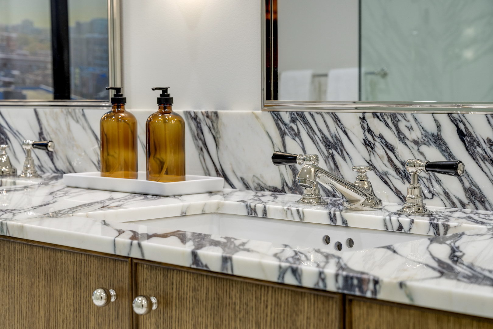 21 North May Street, Unit 1401 Chicago, IL 60607 - Photo 21 of 25 a close view of sink and tap