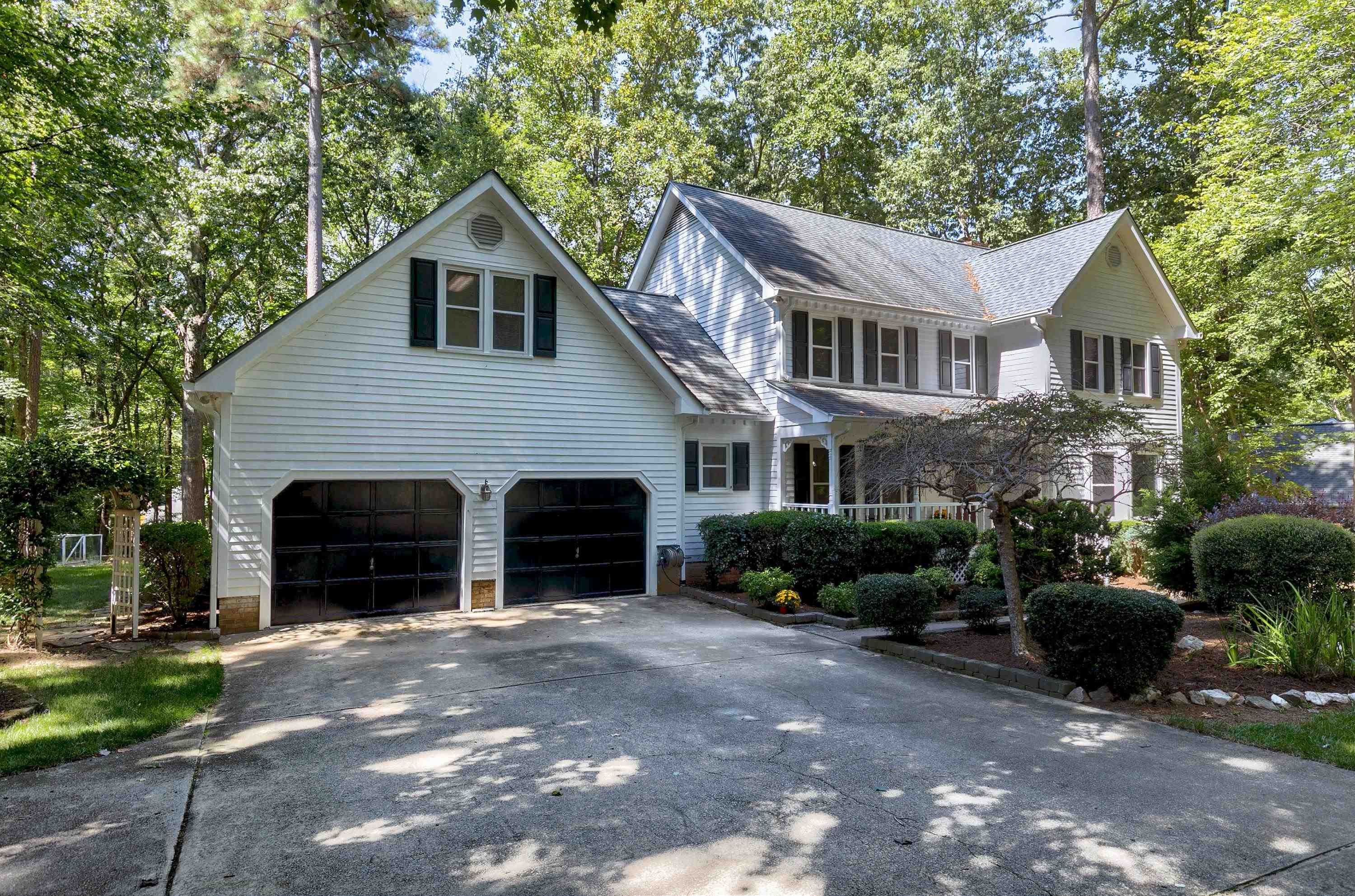 11305 Old Creedmoor Road Raleigh, NC 27613 - Photo 2 of 33 Oversized 2 car Garage Plus Parking Pad