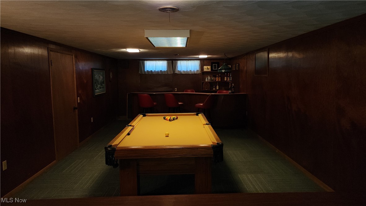 8355 Dalepoint Road Independence, OH 44131 - Photo 23 of 27 Rec room with wooden walls, dark carpet, and billiards