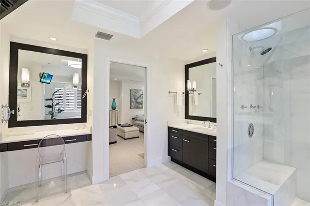 a spacious bathroom with a tub shower and sink