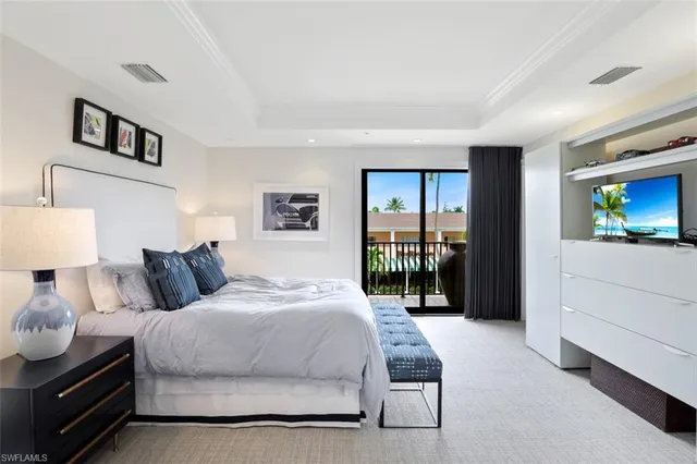 a bedroom with a bed and a view of bedroom