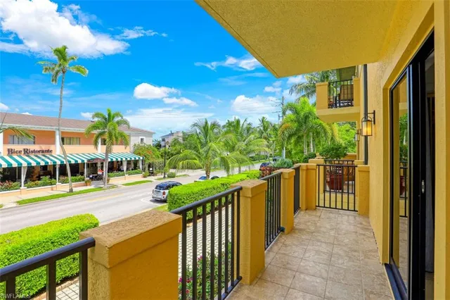 a view of a pathway of a building from a balcony