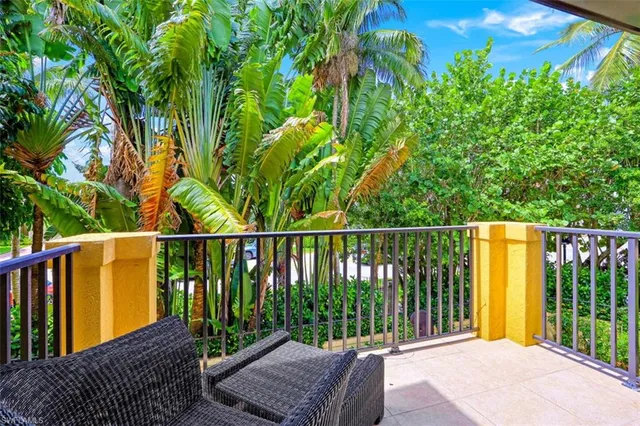 a balcony with a garden view