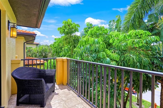 a view of balcony with furniture