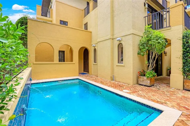 a view of an house with backyard space and garden