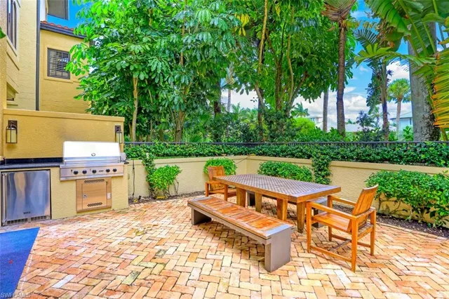 a yard with table and chairs