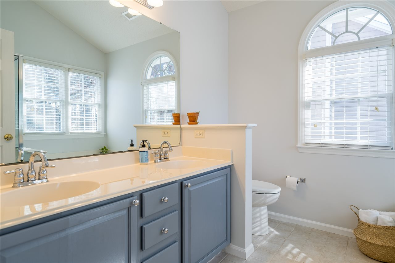 5221 Denmead Way Raleigh, NC 27613 - Photo 20 of 28 Owner's suite bathroom with glass enclosed shower, garden tub and dual vanities! Owner's Suite