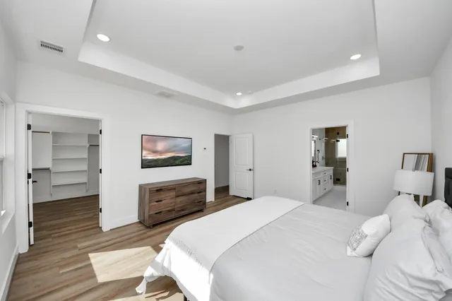 a bathroom with a double vanity sink mirror and double