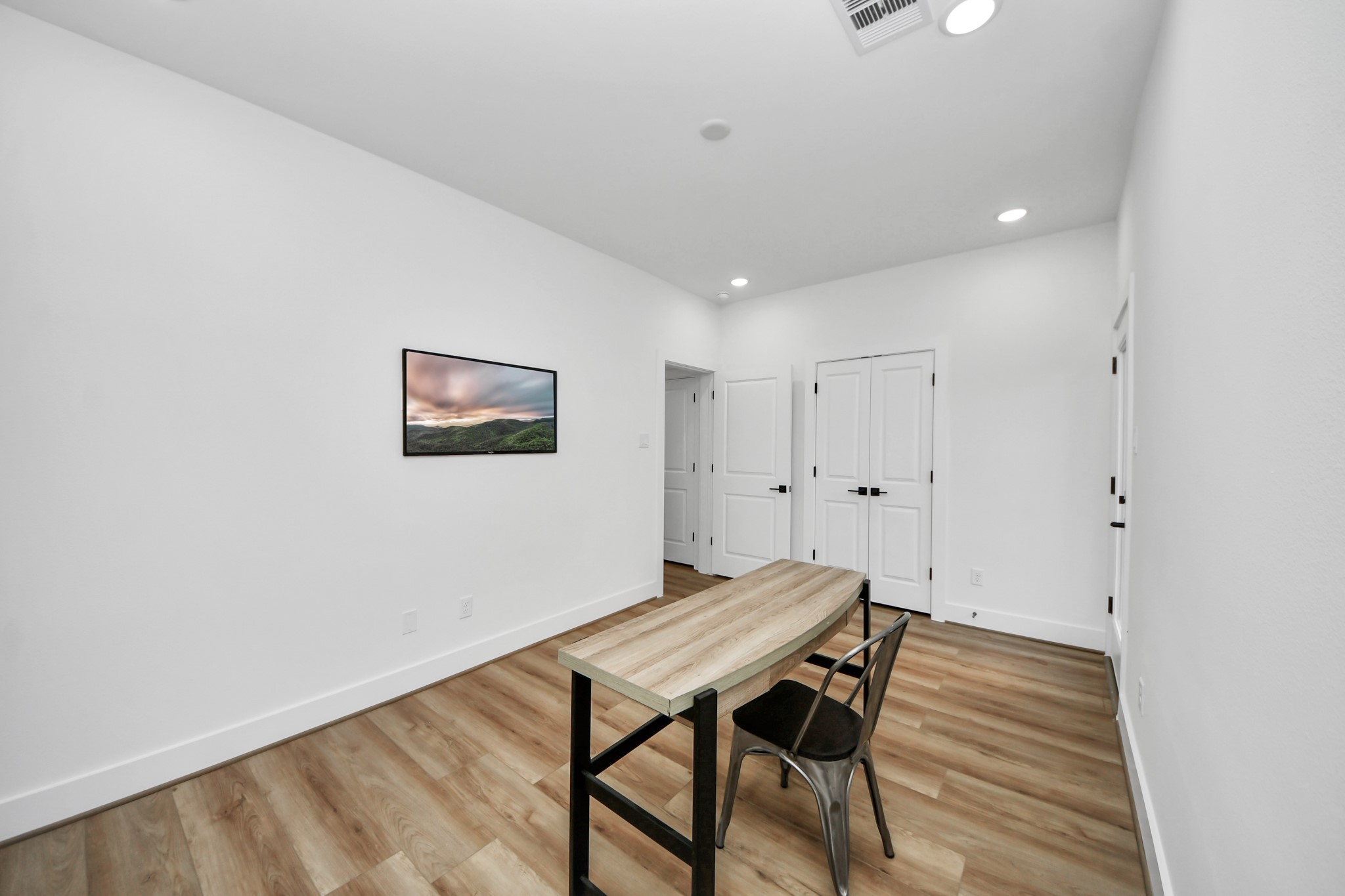 4804 Elysian Street, Unit B Houston, TX 77009 - Photo 4 of 49 a view of a room with furniture and wooden floor