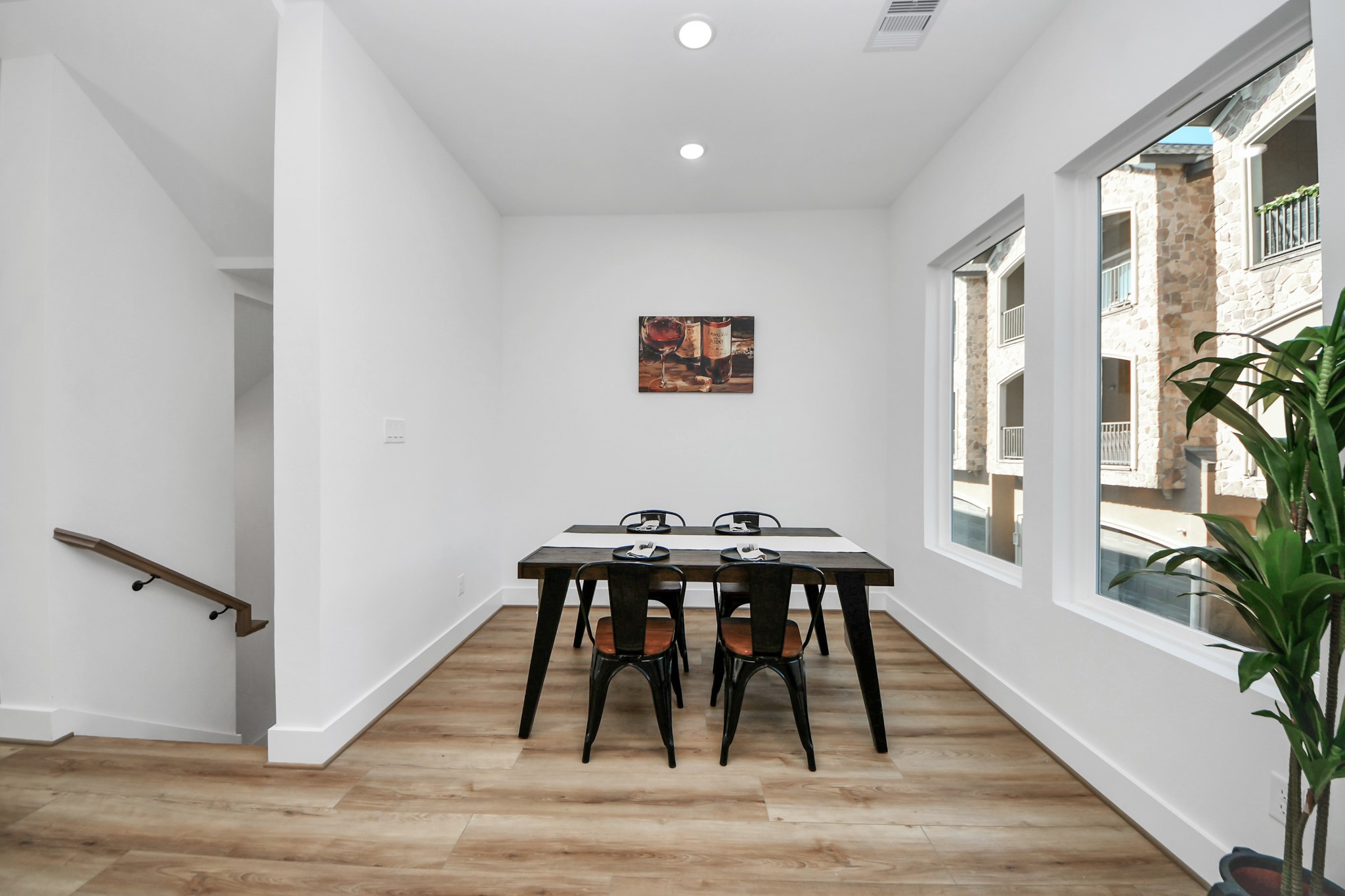 4804 Elysian Street, Unit B Houston, TX 77009 - Photo 9 of 49 a view of a dining room with furniture and wooden floor