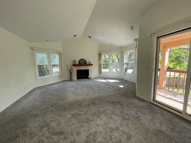 a view of livingroom with furniture and floor to ceiling window