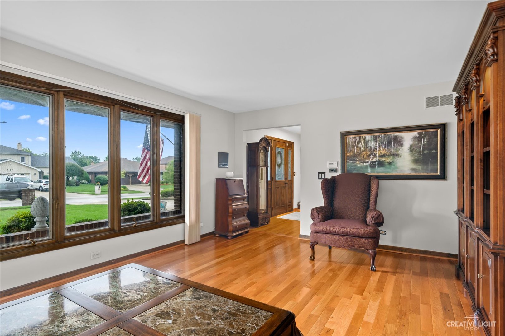 1130 Thatcher Lane Addison, IL 60101 - Photo 13 of 35 a living room with furniture and a rug