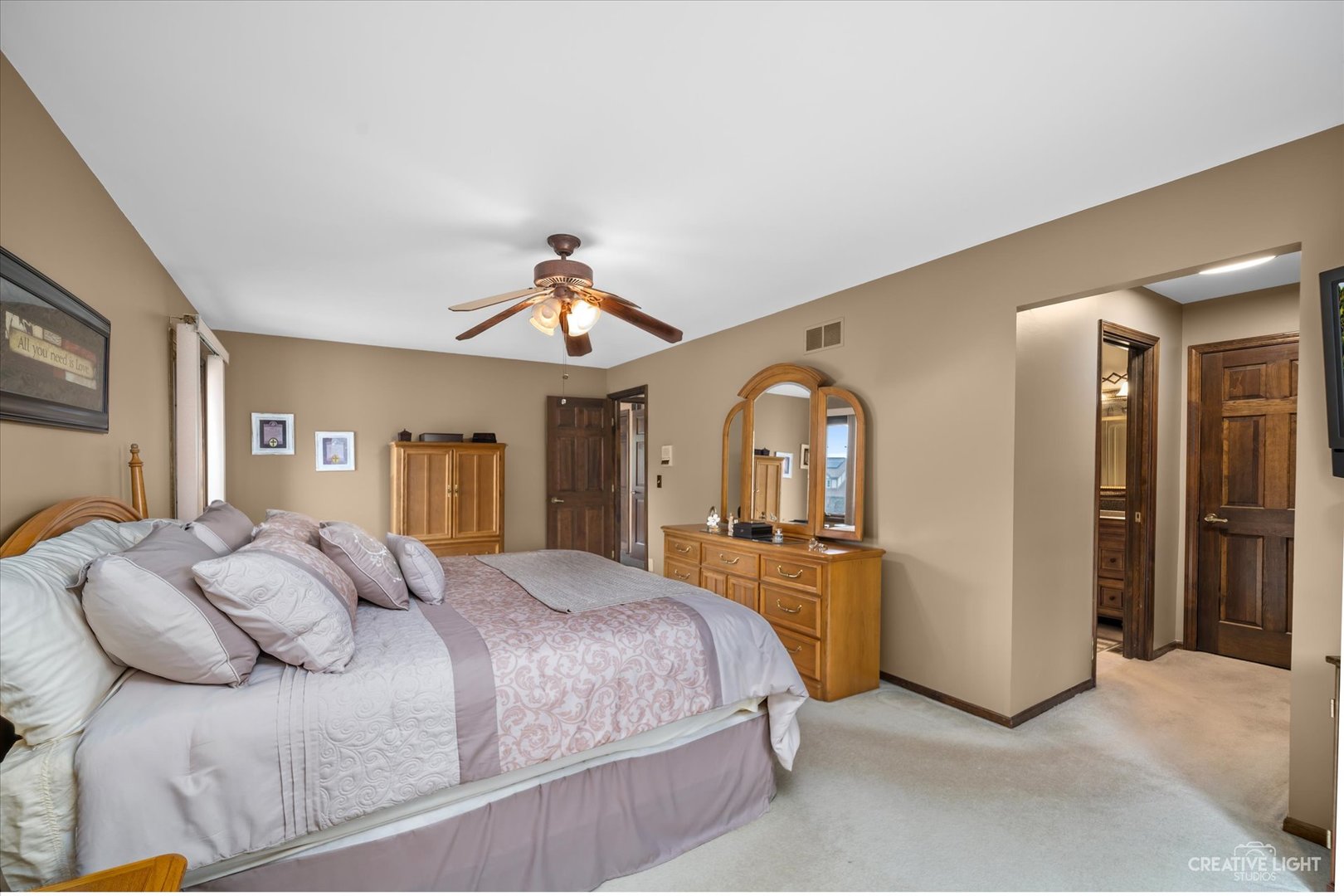 1130 Thatcher Lane Addison, IL 60101 - Photo 16 of 35 a bedroom with a bed closet and window