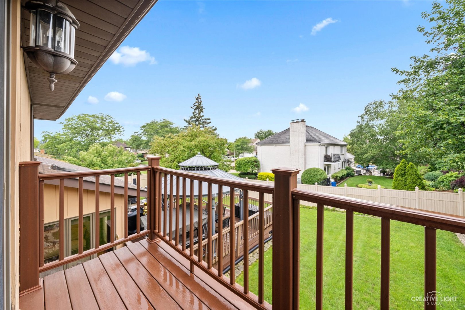 1130 Thatcher Lane Addison, IL 60101 - Photo 17 of 35 a view of a balcony with wooden floor