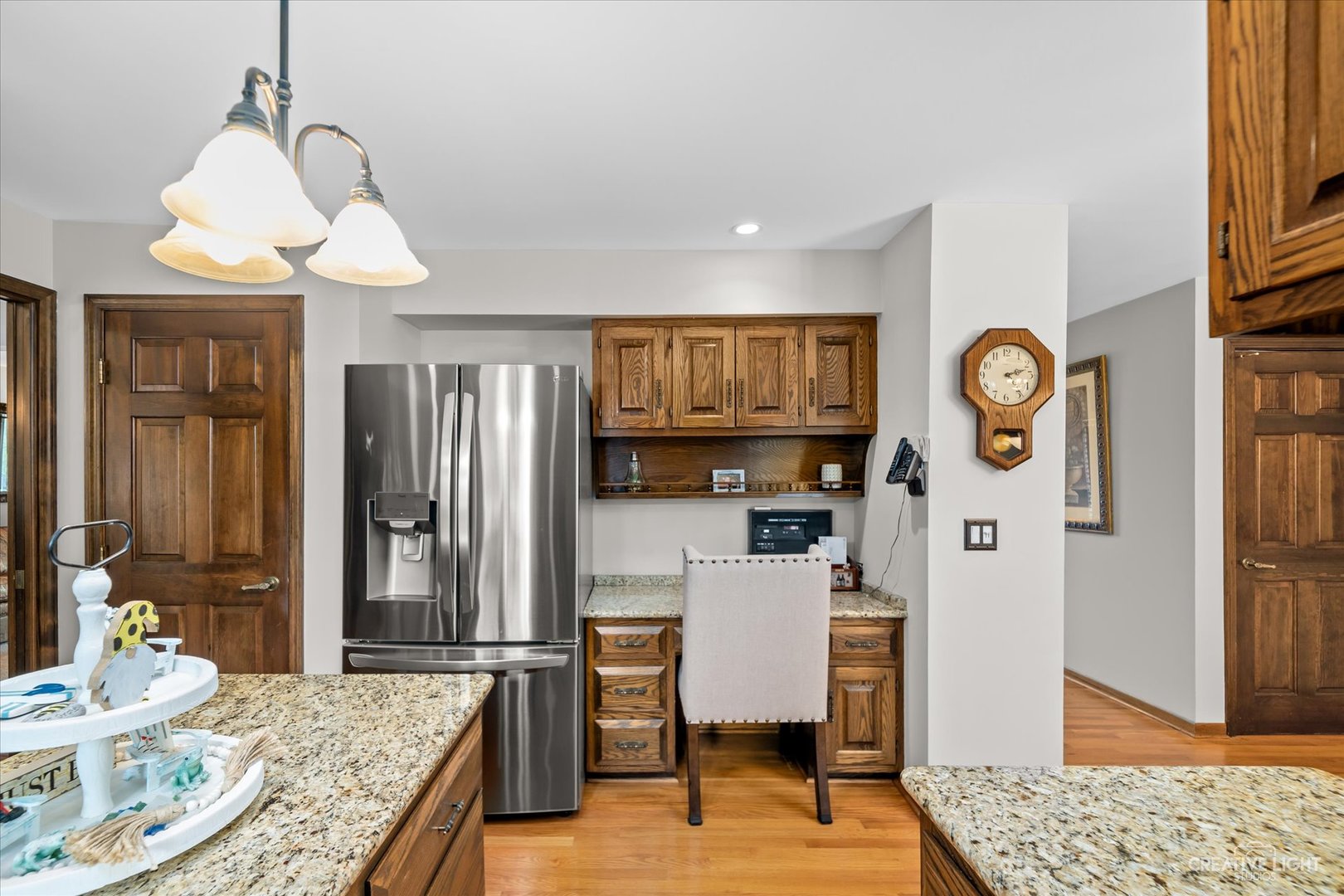 1130 Thatcher Lane Addison, IL 60101 - Photo 6 of 35 a kitchen with stainless steel appliances granite countertop a refrigerator and microwave