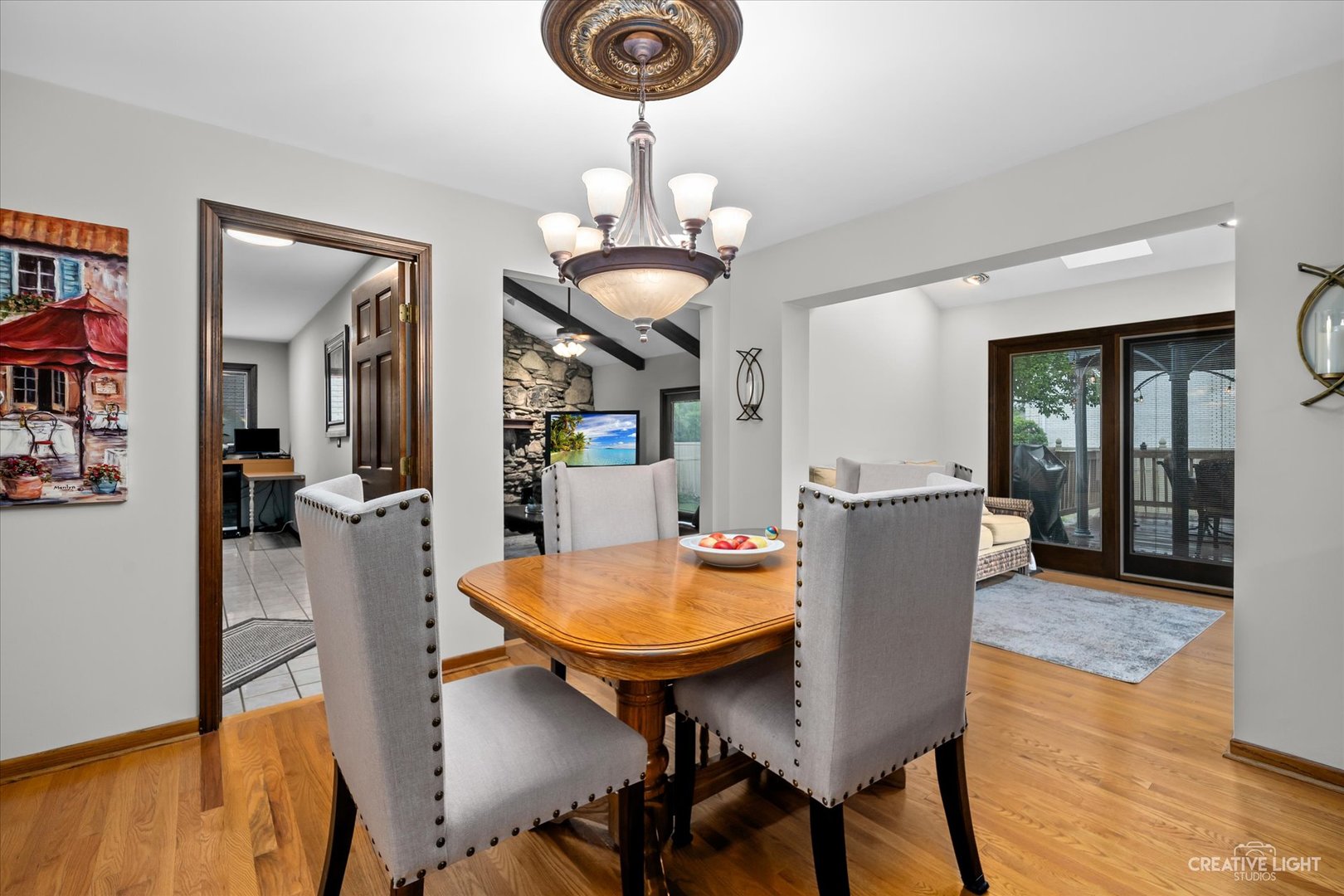 1130 Thatcher Lane Addison, IL 60101 - Photo 7 of 35 a view of a dining room with furniture and wooden floor