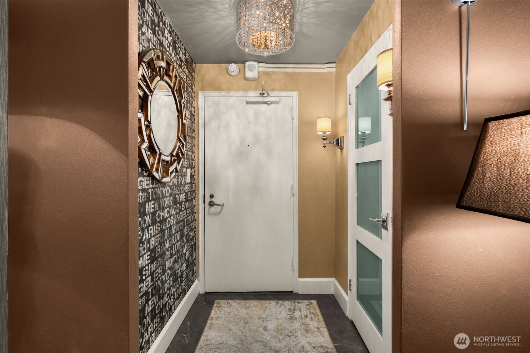 1105 Spring Street, Unit 211 Seattle, WA 98104 - Photo 4 of 26 a bathroom with a shower and a sink