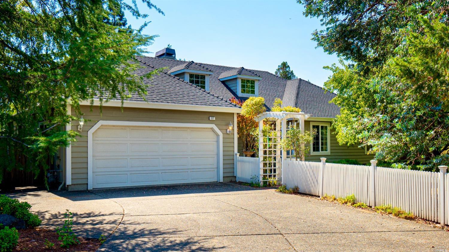227 Granada Place Santa Rosa, CA 95409 - Photo 1 of 1 a front view of a house with a garage