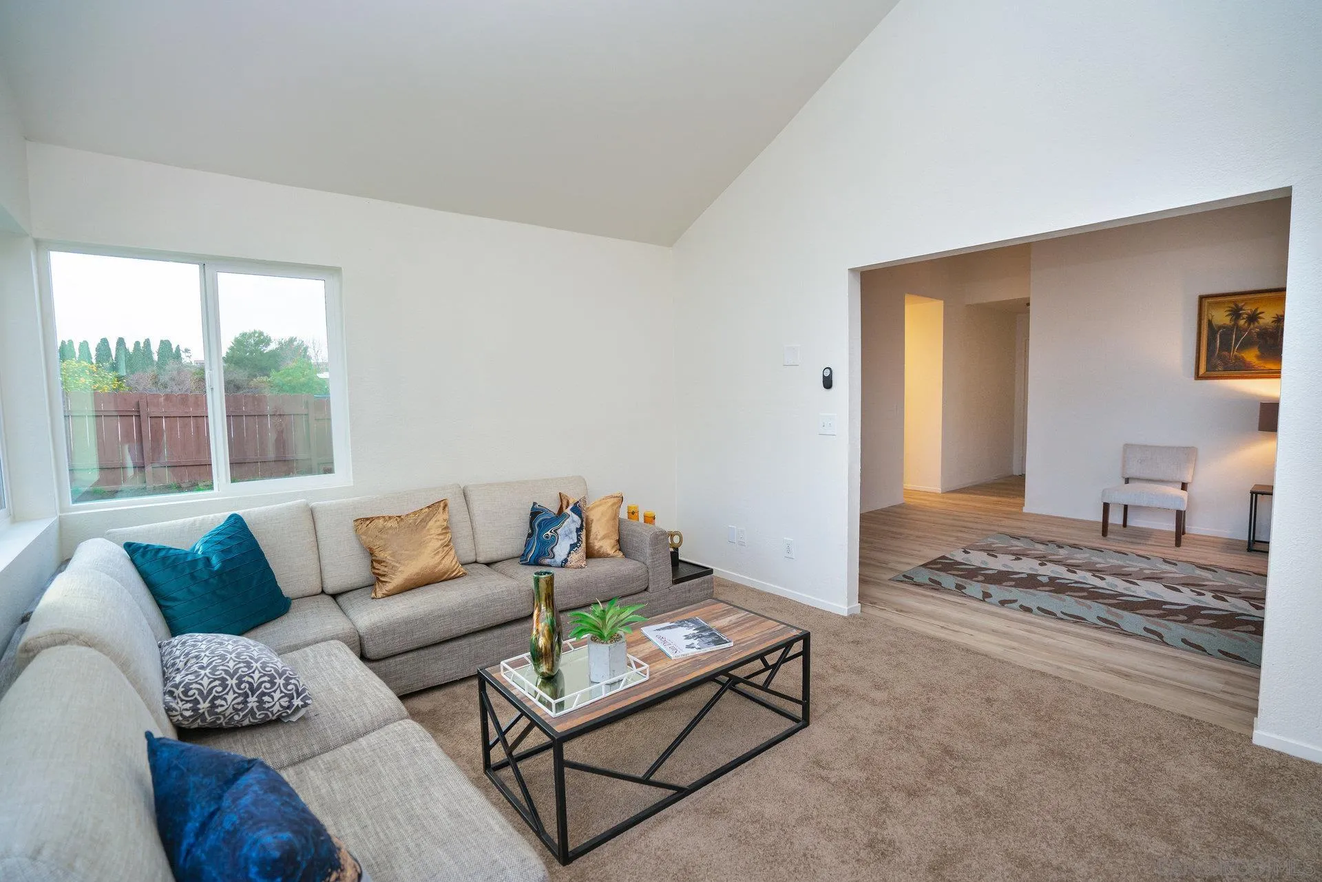 5145 Francis Street Oceanside, CA 92057 - Photo 4 of 21 a living room with furniture and a window