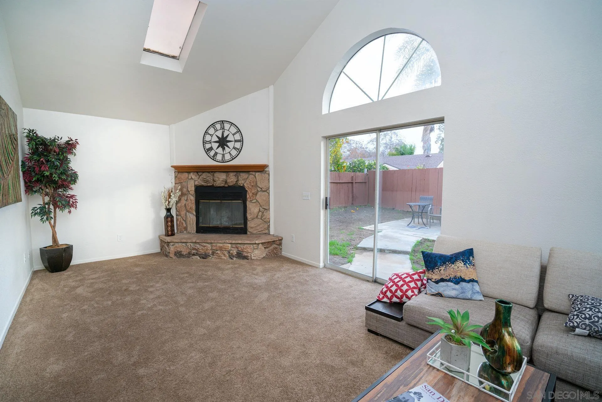 5145 Francis Street Oceanside, CA 92057 - Photo 6 of 21 a living room with furniture and a fireplace