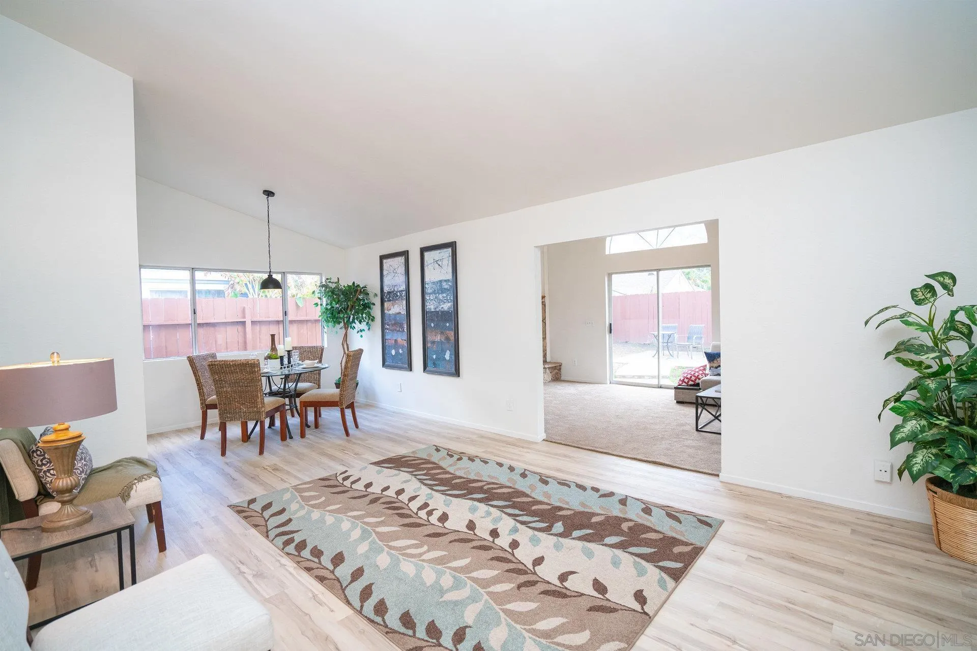 5145 Francis Street Oceanside, CA 92057 - Photo 8 of 21 a living room with furniture windows and a potted plant