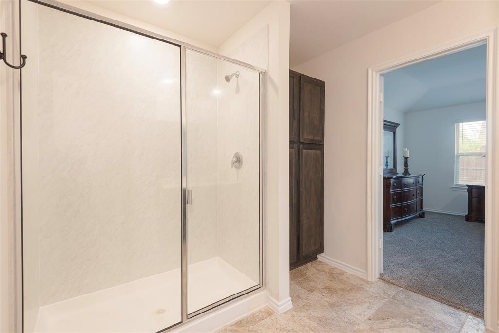 723 Primrose Lane Pilot Point, TX 76258 - Photo 14 of 37 Full bathroom featuring a shower stall