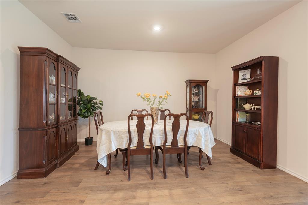 723 Primrose Lane Pilot Point, TX 76258 - Photo 21 of 37 Dining room featuring light wood-style flooring and recessed lighting