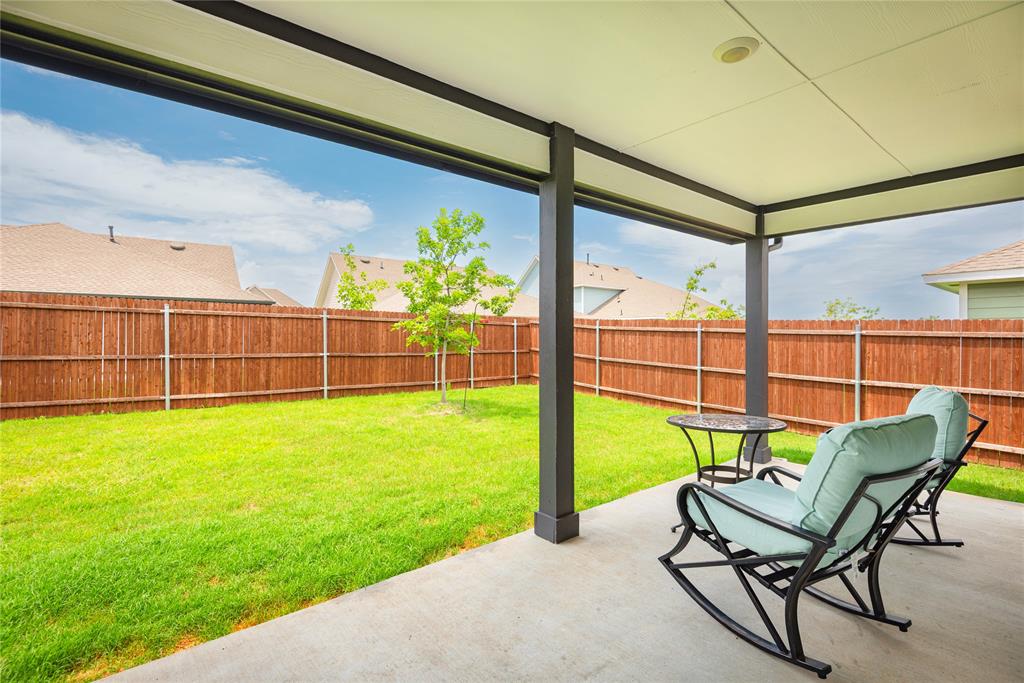 723 Primrose Lane Pilot Point, TX 76258 - Photo 26 of 37 Enjoy the privacy with your favorite beverage and meal, or just relax and watch the world go by as you view a gorgeous sunset!!!