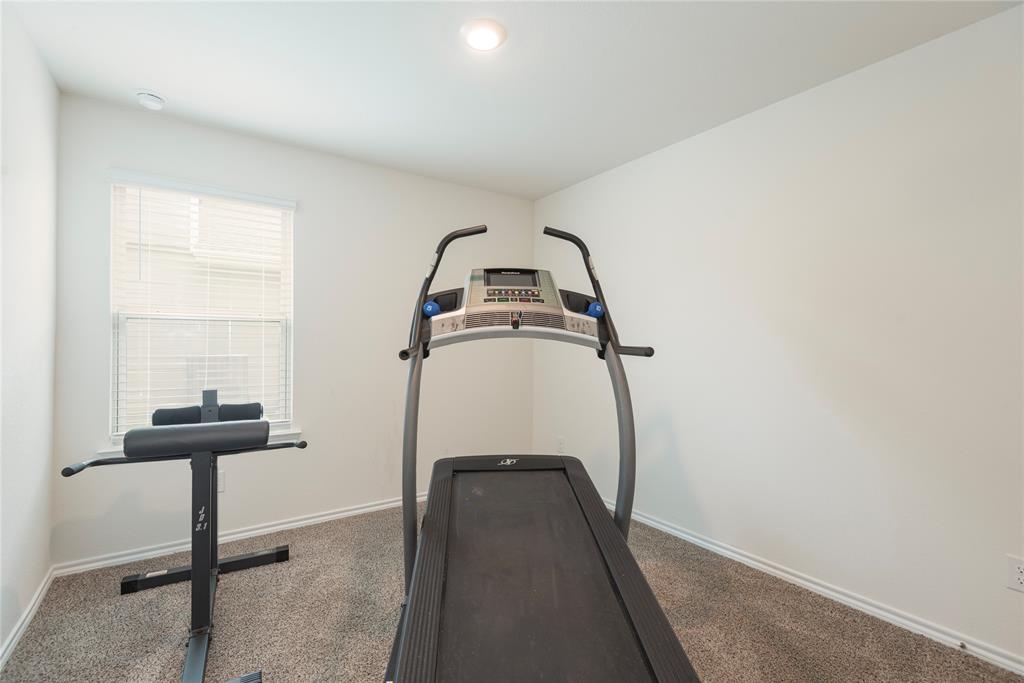 723 Primrose Lane Pilot Point, TX 76258 - Photo 10 of 37 BEDROOM 3 IS CURRENTLY BEING USED AN EXCERSICE ROOM