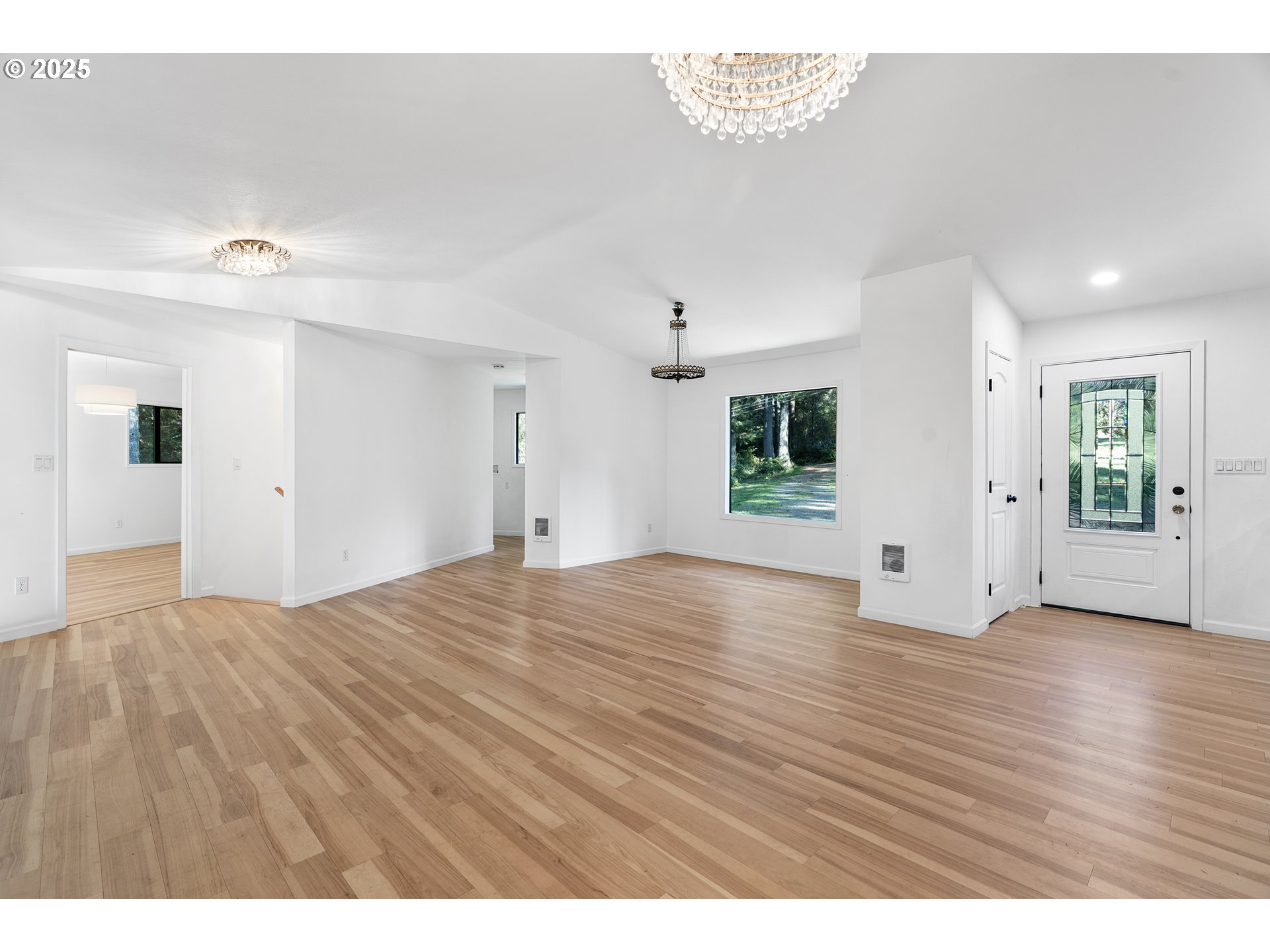 95708 Horton Lane Brookings, OR 97415 - Photo 7 of 46 a view of empty room with wooden floor