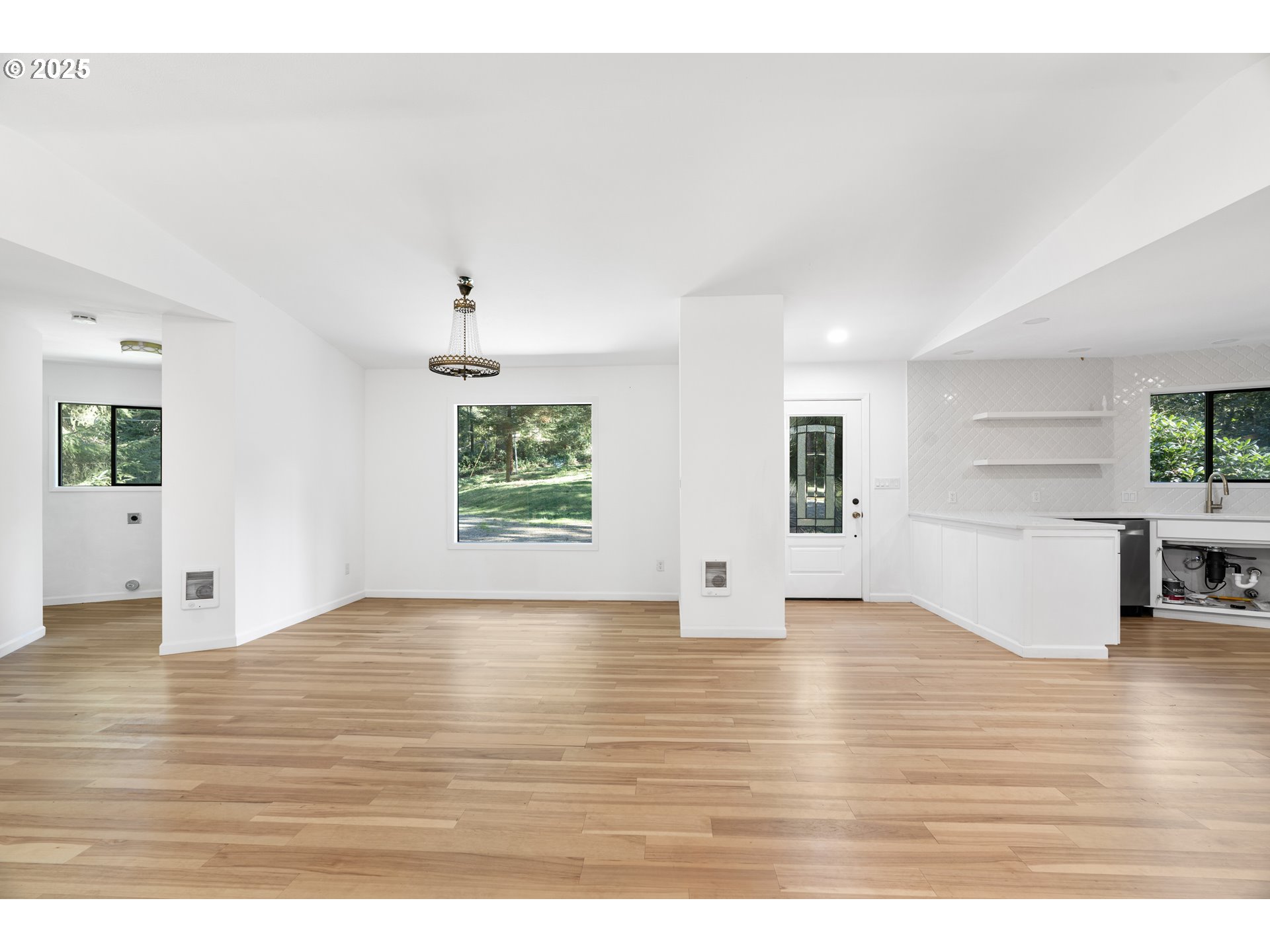 95708 Horton Lane Brookings, OR 97415 - Photo 8 of 46 a view of empty room with wooden floor